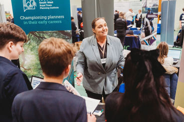 Kelly talks to students