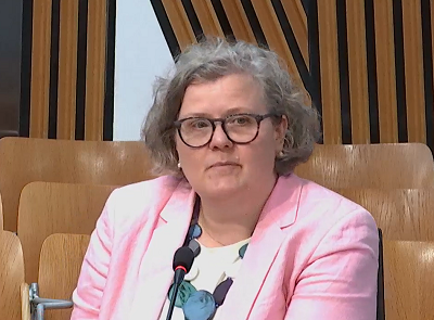 Caroline giving evidence at the session
