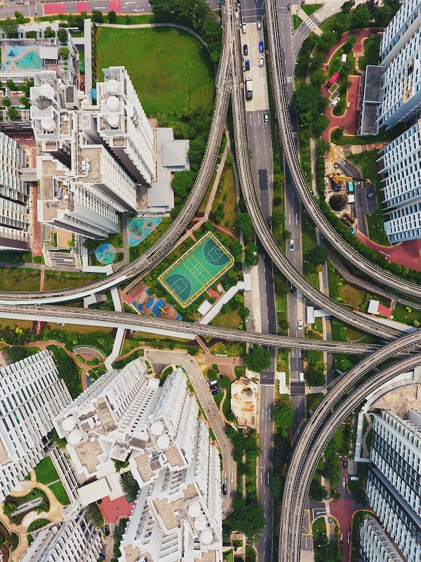 Busy junction surrounded by high-rise buildings