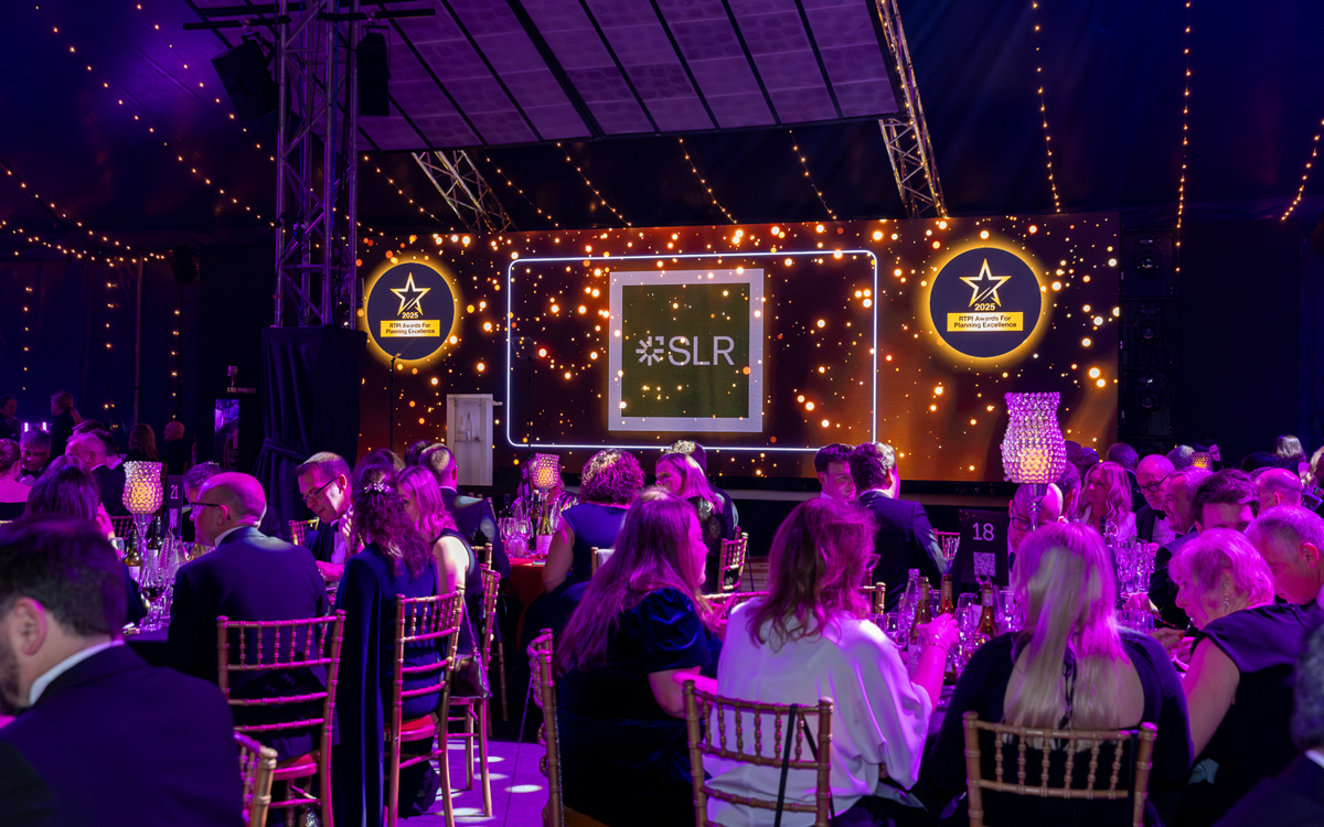 Awards for Planning Excellence 2025 ceremony with sponsor SLR logo on screen